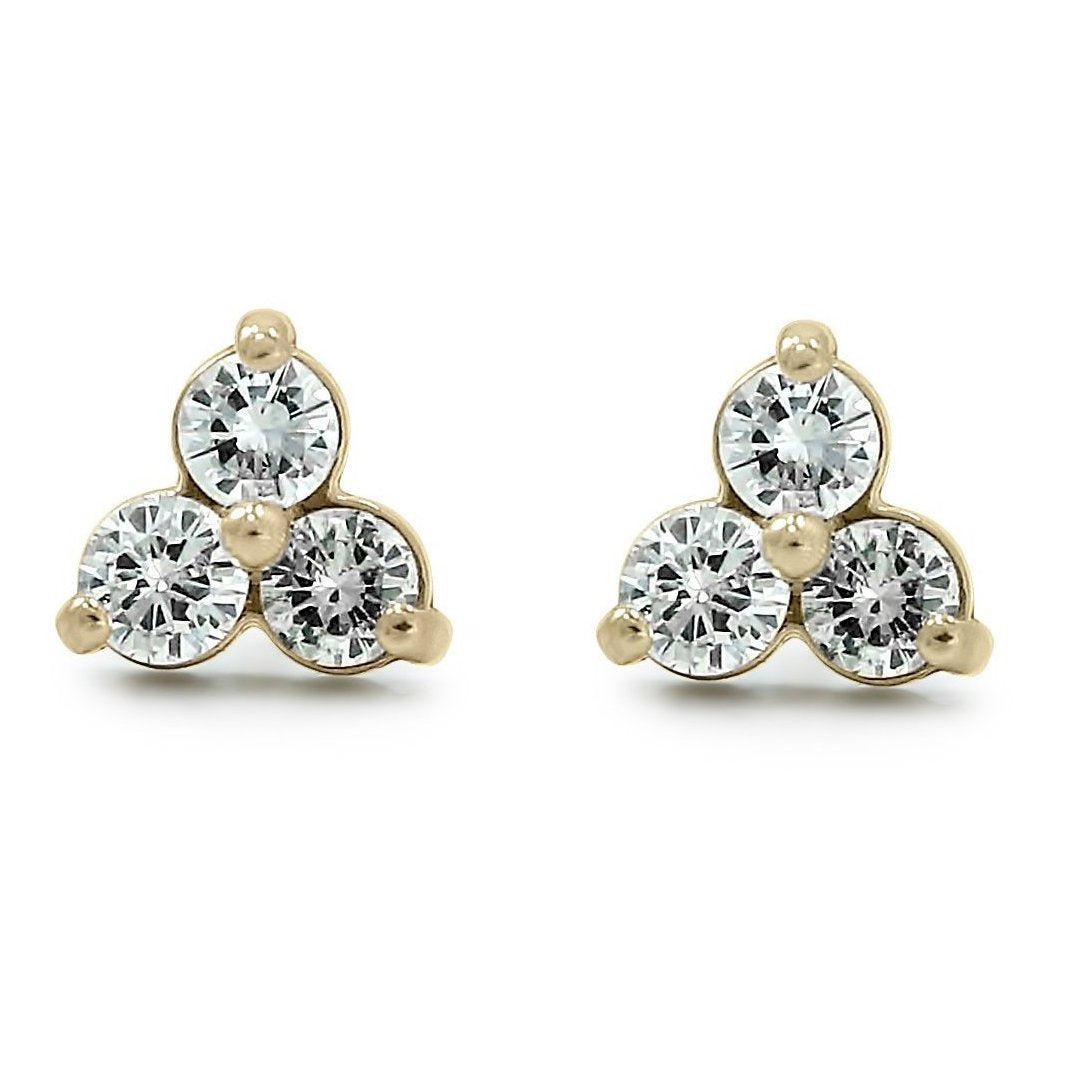 three diamond bezel set yellow gold stud earrings with prongs