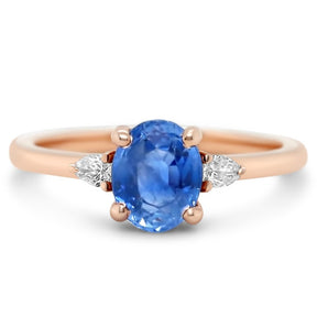 14k rose gold three stone light blue oval sapphire ring with dainty pear diamonds