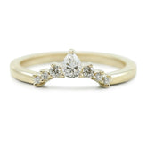 diamond pear shaped contour wedding band available in yellow white or rose gold.