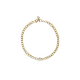 14k yellow gold curb chain bracelet with bezel set pear shape diamond