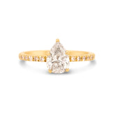 14k yellow gold 1ct pear shape diamond five prong set with half band diamond pave engagement ring