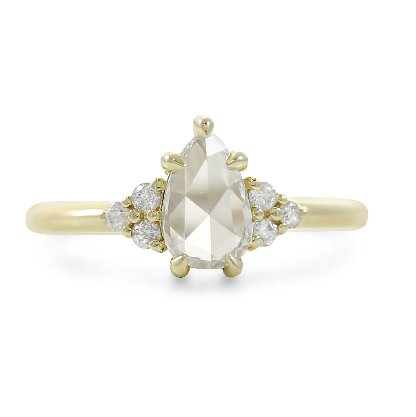 14k yellow gold rose cut pear diamond engagement ring with round diamond cluster side stones