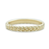 braided wedding band available in yellow, white or rose gold