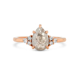 14k rose gold pear shape rose cut gray diamond with round brilliant diamond trio side stones