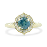 1.10ct round no heat kenya sapphire engagement ring with a custom diamond halo and a 14k yellow gold rope band