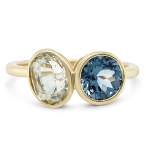 14k yellow gold two stone bezel set oval and round sapphire and spinel ring