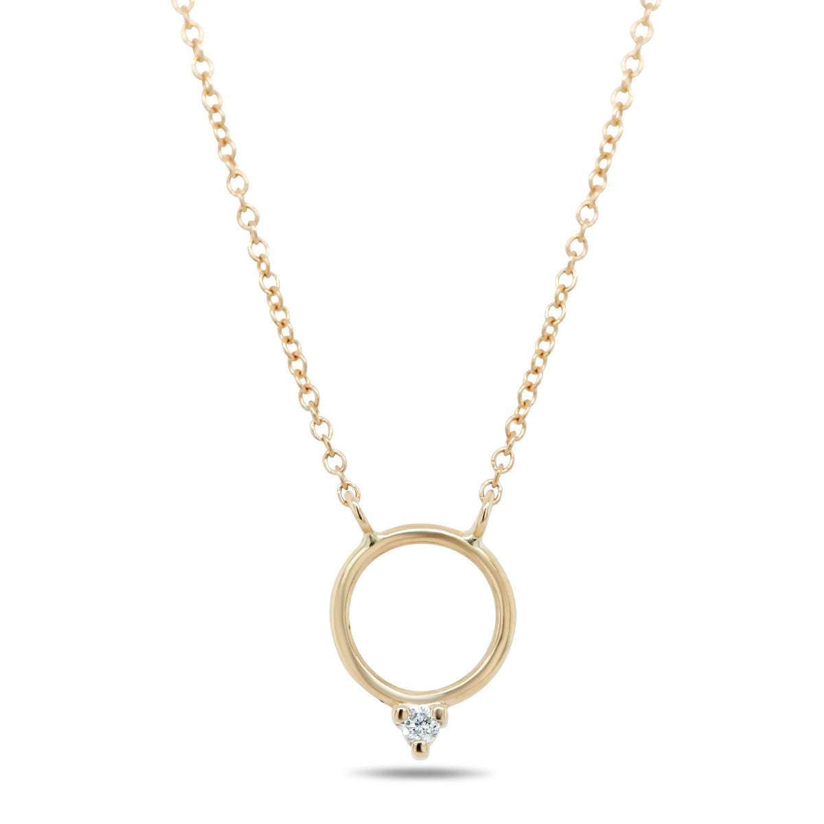 14k yellow gold circle necklace with a dainty diamond on a 16in chain