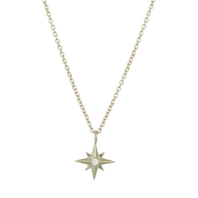 14k yellow gold star necklace with a dainty round diamond 16in long chain under $500
